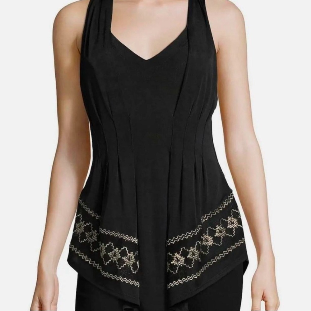 Free people. All eyes on Me embroidered top. Black and gold size small.